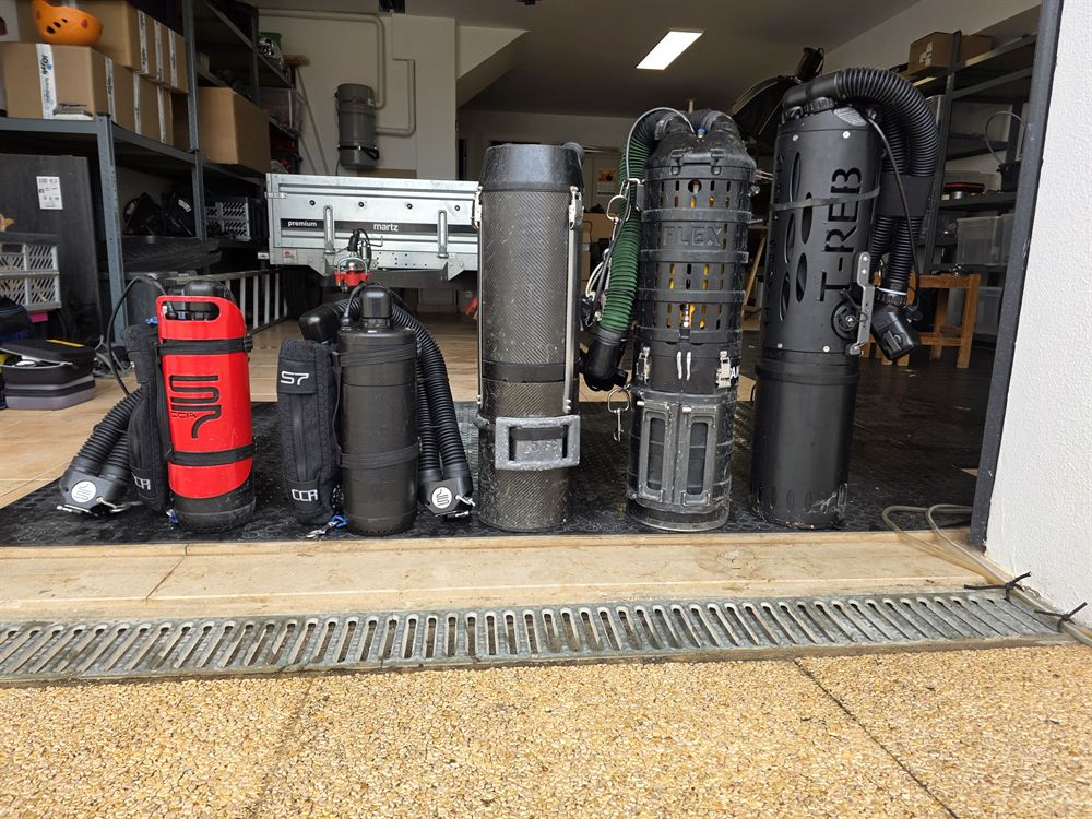 Several rebreathers side by side, including two S7 units and a T-Reb